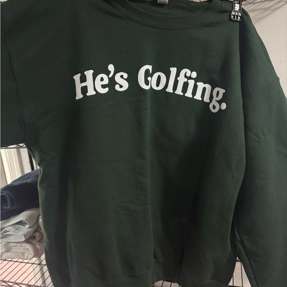 He’s golfing. Shirt